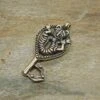 Viking Gripping Bear Key Pendant -The Viking Dragon ad bronze gripping beast key pendant on rock