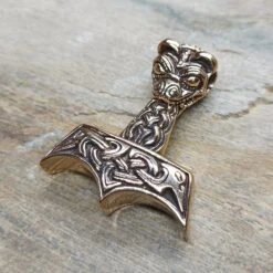 Large And Ferocious Thors Hammer Pendant 17 Large And Ferocious Thors Hammer Pendant -The Viking Dragon ad bronze large and ferocious thors hammer on rock angle view 7f78b5b4 2778 4fae 8976 9907534696b6