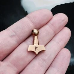 Small Knotwork Thors Hammer Pendant -The Viking Dragon ad bronze small knotwork thors hammer pendant on hand back view