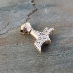Ferocious Beast Thors Hammer Pendant -The Viking Dragon ad ferocious beast thors hammer on rock bronze back angle view