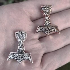 Ferocious Beast Thors Hammer Pendant -The Viking Dragon ad ferocious beast thors hammers on hand silver and bronze