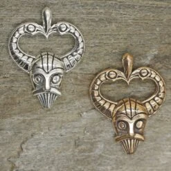 The Viking Dragon 18 The Viking Dragon -The Viking Dragon ad odin mask pendants on rock
