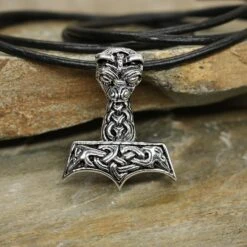 Large And Ferocious Thors Hammer Pendant 16 Large And Ferocious Thors Hammer Pendant -The Viking Dragon ad silver large ferocious thors hammer with thong on rock
