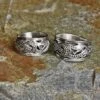 Silver Openwork Ringerike Viking Dragon Ring -The Viking Dragon ad silver openwork viking dragon ring in 2 sizes on rock