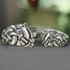 Silver Urnes Viking Dragon Ring -The Viking Dragon ad silver urnes dragon rings on ledge