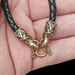 Braided Leather Necklace With Bronze Gotlandic Dragon Heads -The Viking Dragon bt bronze 5mm braided leather necklace gotland dragon heads butterfly fitting in hand