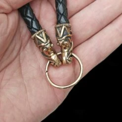 Braided Leather Necklace With Bronze Gotlandic Dragon Heads -The Viking Dragon bt bronze 8mm braided leather necklace gotland dragon heads split ring in hand