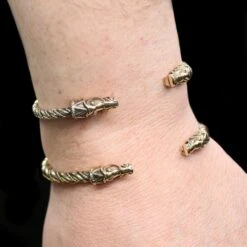 Twisted Bronze Bracelet With Gotlandic Dragon Heads 8 Twisted Bronze Bracelet With Gotlandic Dragon Heads -The Viking Dragon bt bronze twisted bracelets gotland dragon heads on wrist