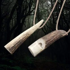 Scottish Red Deer Handmade Antler Whistle -The Viking Dragon ch antler whistles on natural leather thongs angle view