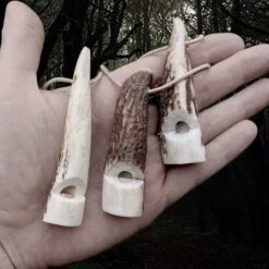 Scottish Red Deer Handmade Antler Whistle -The Viking Dragon ch antler whistles on natural leather thongs on hand front views