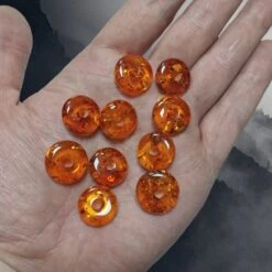 Polished Amber Donut Bead 7 Polished Amber Donut Bead -The Viking Dragon eg amber donut beads on hand