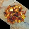 Polished Amber Chips With Drilled Holes -The Viking Dragon eg polished amber beads on rock x 20g