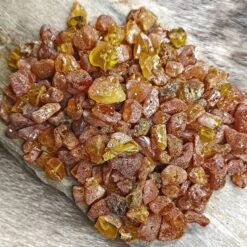 Amber Chips With Drilled Holes 11 Amber Chips With Drilled Holes -The Viking Dragon eg raw amber chips with drilled holes 100g