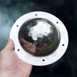 Polished Domed Viking Shield Boss With Rivet Holes -The Viking Dragon mi polished viking shield boss in hand