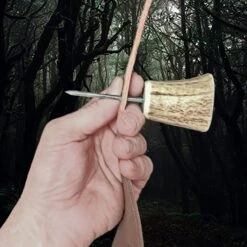 Awl With Antler Handle 12 Awl With Antler Handle -The Viking Dragon ms antler awl punched through leather