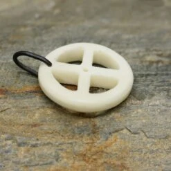 Bone Sun Cross Odin Pendant -The Viking Dragon ms bone sun cross pendant new on rock side view