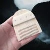 Rounded Bone Viking Comb 1 Rounded Bone Viking Comb -The Viking Dragon nc bone comb rounded in hand