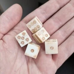 Large Bone Dice With Brown Dot And Rings Marks 10 Large Bone Dice With Brown Dot And Rings Marks -The Viking Dragon nc large bone dice brown dot and ring on hand 5