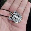 Silver Drakkar Viking Ship With Sword Pendant 1 Silver Drakkar Viking Ship With Sword Pendant -The Viking Dragon nl silver drakkar sword ship pendant on hand angle view