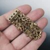 Large Bronze Viking / Saxon Strap End From Winchester 2 Large Bronze Viking / Saxon Strap End From Winchester -The Viking Dragon pc bronze large winchester strap end on hand