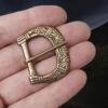 10th - 11th Century Replica Medium Viking Bronze Buckle From Birka -The Viking Dragon pc bronze medium deorated viking buckle on hand