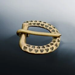 9th - 10th Century Bronze Replica Saxon Buckle With Stamped Design -The Viking Dragon pc bronze sxaon buckle punched design side angle view