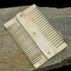 Double Sided Bone Viking Comb 2 Double Sided Bone Viking Comb -The Viking Dragon pm double sided viking bone comb on rock
