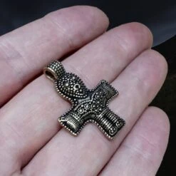 Bronze Crucifix Pendant -The Viking Dragon pp bronze crucifix pendant on hand side angle view