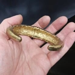 Bronze Replica Viking Bracelet / Arm Ring From Orupgard -The Viking Dragon pp bronze large arm ring from orupgard in hand back view