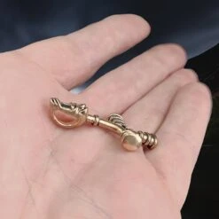 Bronze Wolf Cross Thors Hammer Pendant -The Viking Dragon pp bronze small icelandic wolf hammer on hand side angle view