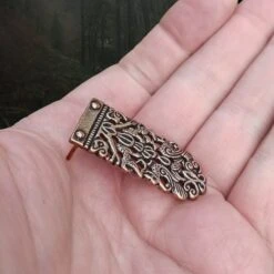 Small Bronze Viking / Saxon Strap End From Winchester -The Viking Dragon pp bronze winchester viking saxon strap end on hand side angle view