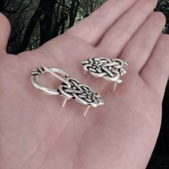 Silver Plated Ringerike Style Knotwork Viking Buckle Set 9 Silver Plated Ringerike Style Knotwork Viking Buckle Set -The Viking Dragon pp silver plated viking knotwork buckle set on hand side angle view