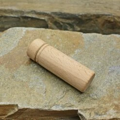 Wooden Viking / Medieval Needlecase -The Viking Dragon qs small wooden needle case on rock side