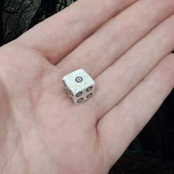 Medium Bone Dice With Black Dot And Rings Marks -The Viking Dragon rc medium bone die on hand