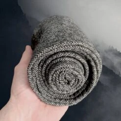 Herringbone Weave Wool Leg Wraps / Viking Winingas -The Viking Dragon ro wool herringbone dark grey leg wrap in hand