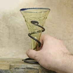 Blue Rim Decorated Glass Viking Cone Beaker With Iron Stand -The Viking Dragon sg decorated viking cone beaker with blue rim on rock with hand