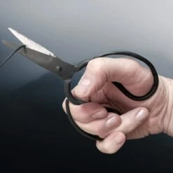 Iron Dressmaking Scissors -The Viking Dragon sg iron dress making scissors in hand cutting cord