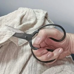 Iron Dressmaking Scissors -The Viking Dragon sg iron dress making scissors in hand cutting linen