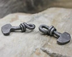 Iron Viking Thors Hammer Pendant From Birka -The Viking Dragon sg iron thors hammers from birka on rock side view