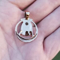 Bronze Circular Freya Pendant 10 Bronze Circular Freya Pendant -The Viking Dragon sn bronze circular freya pendant in hand back view