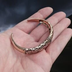 Danish Viking Bronze Bracelet From Falster -The Viking Dragon sn bronze falster bracelet on hand top angle view