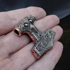 Large Bronze Skåne Thors Hammer Pendant -The Viking Dragon sn bronze large skane hammer on hand side angle view