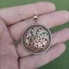 Large Bronze Sun Wheel Pendant -The Viking Dragon sn bronze large sunwheel pendant on hand