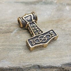 Large Bronze Thors Thunder Hammer Pendant 9 Large Bronze Thors Thunder Hammer Pendant -The Viking Dragon sn bronze large thunder hammer on rock back angle view