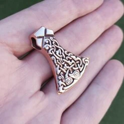 Bronze Mammen Axe Head Pendant 14 Bronze Mammen Axe Head Pendant -The Viking Dragon sn bronze mammen axe head pendant on hand angle view