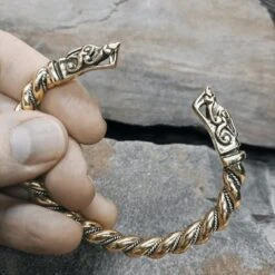 Twisted Bronze And Silver Bracelet With Gotlandic Dragon Heads -The Viking Dragon sn bronze silver twisted bracelet gotland dragon heads in fingers