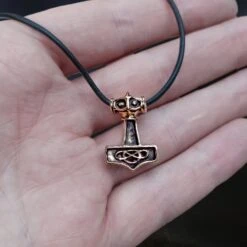 Small Bronze Thunder Thors Hammer Pendant 13 Small Bronze Thunder Thors Hammer Pendant -The Viking Dragon sn bronze small thunder hammer viking pendant on leather thong on hand