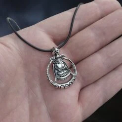 Silver Circular Freya Replica Viking Pendant -The Viking Dragon sn silver circular freya pendant on leather thong on hand