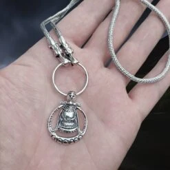 Silver Circular Freya Replica Viking Pendant -The Viking Dragon sn silver circular freya pendant on split ring with tromso heads silver snake chain necklace on hand