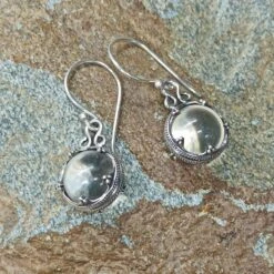 Silver Gotland Crystal Ball Earrings -The Viking Dragon sn silver crystal ball earrings on rock